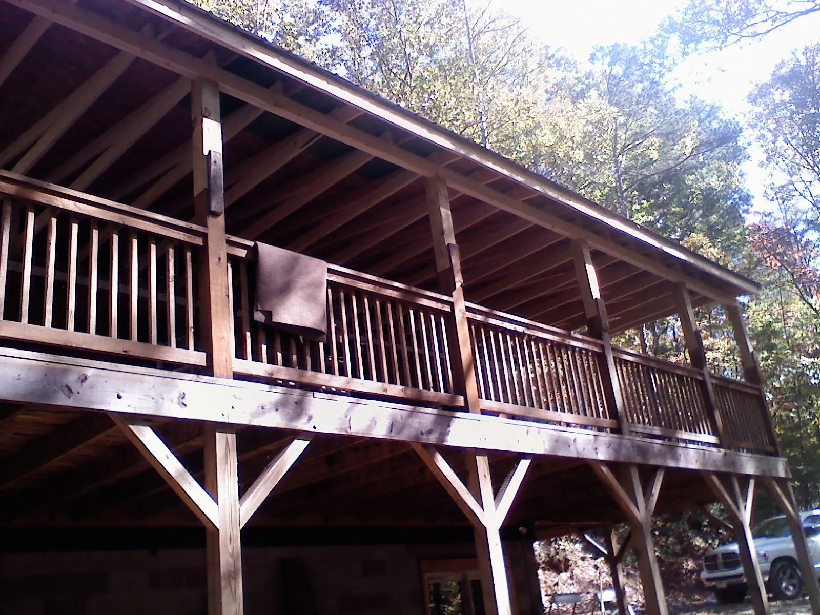 Timber framing under a new elevated porch and deck — Roof Leak Repair in Falconer by Roofing Brothers